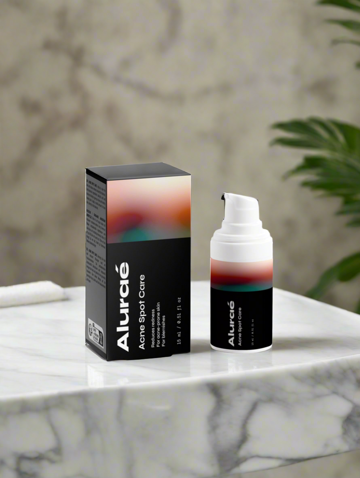 Aluráe Acne Spot Care on a marble surface, targeting skin imperfections with salicylic acid for clearer skin.